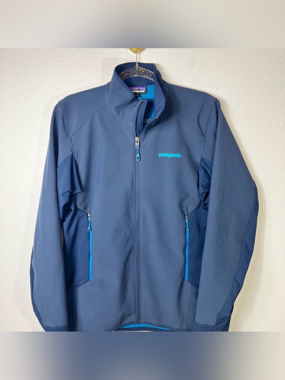 Patagonia Navy Blue Softshell Jacket with Teal Accents